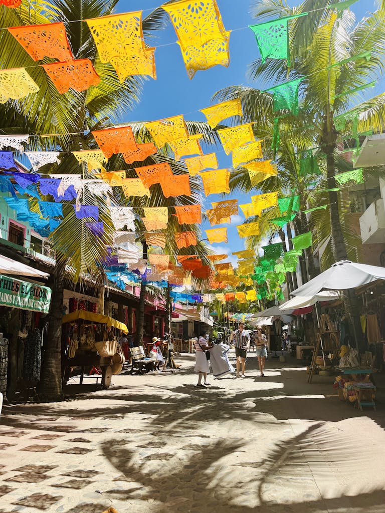 Colorful Papel Picado Flags Adorn A Lively Street In Sayulita Mexico. 34020177 768x1024